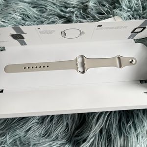 NIB Apple Watch sports band in Starlight 41mm size m/l